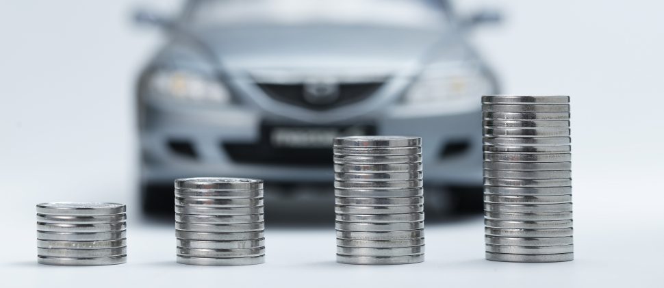 coin stacks in front of car